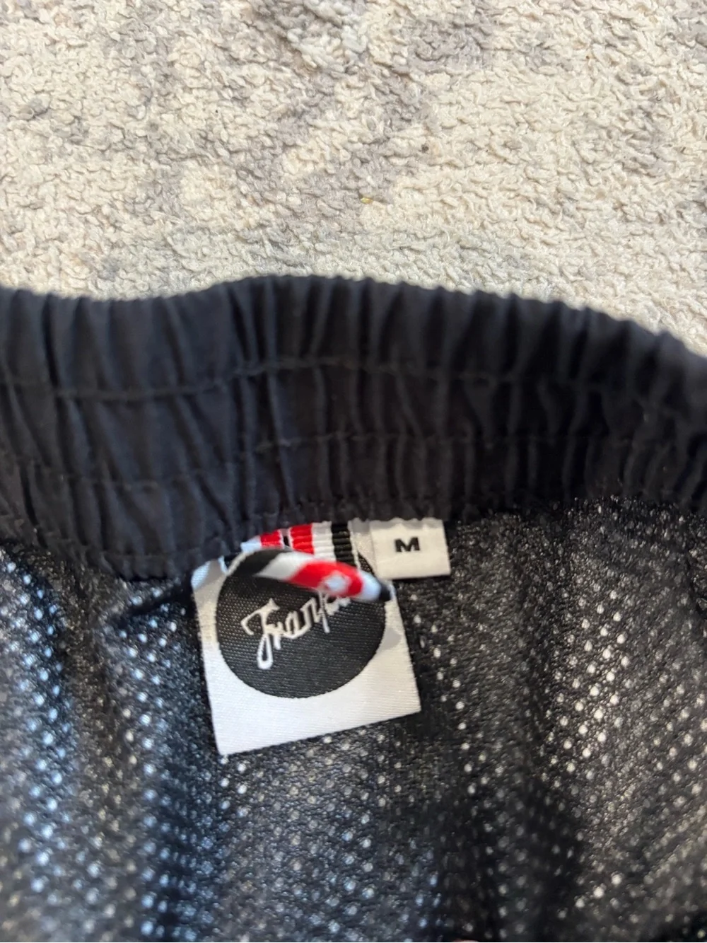 Black Mesh-Lined Swim Shorts with Signature Tab